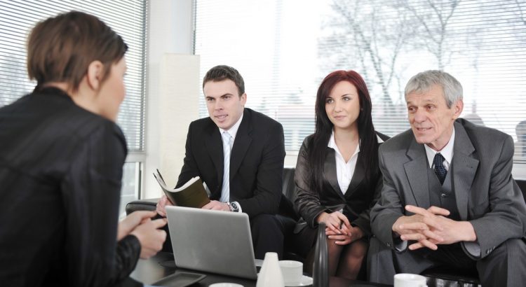 businesswoman-in-an-interview-with-three-business-people